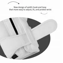 Niestandardowe rękawice bokserskie w ustalony sposób. Możemy dostosować stały sposób rękawic bokserskich do Twoich potrzeb, na przykład możesz zamówić różne rozmiary haczyków i pętelek oraz konstrukcję zapięcia. Dostępne jest również mocowanie za pomocą sznurówek lub kompozytu sznurowadeł i rzepów.