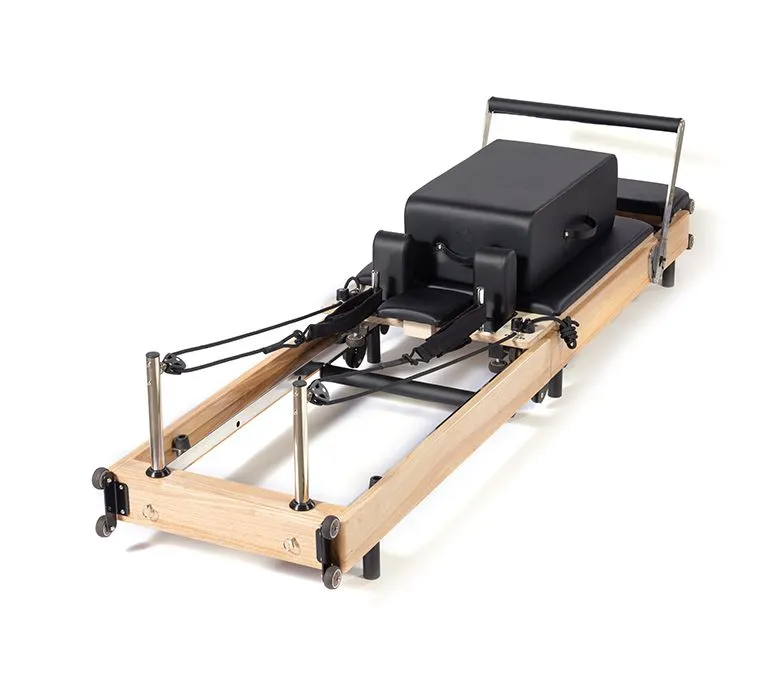 Składany, dębowy reformator do pilatesu bez połączeń