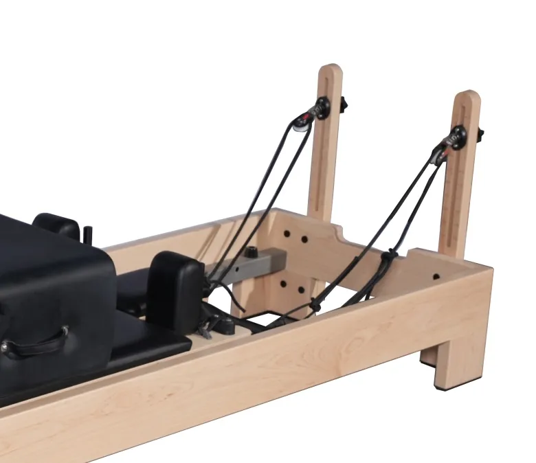 Trening ciała Core Bed Maple Wood Pilates Reformer Machine z wewnętrznymi podnóżkami