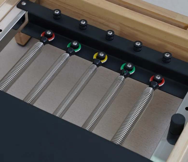 Wysokiej jakości dębowy, składany reformator do pilatesu z drewnianą nogą